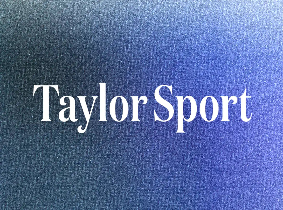 The Taylor Sport logo in white on a textured, gradient blue background.